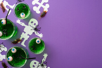 Halloween concept. Top view photo of glasses with green floating eyes punch skeleton silhouettes spiders centipedes and cockroaches on isolated violet background with copyspace