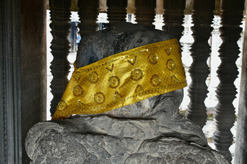 Seated Headless Buddha with Yellow Wrap in Angkor Wat