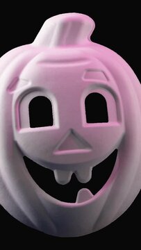 Halloween, melon in the form of a ghost, changes color to red, on a black background, Halloween concept video animation for mobil