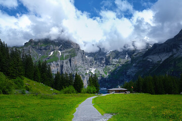 The road to Oeschinen Lake (Oeschinensee) in  Kandersteg, the Bernese Oberland, Switzerland, part of the UNESCO World Heritage Site