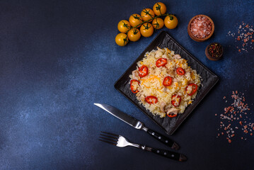 Homemade chinese fried rice with vegetables and a chicken