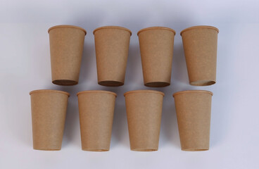 glasses made of natural materials are laid out on a white table. High quality photo