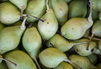 pears on a market stall