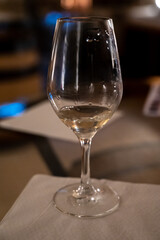 Wine tasting in underground cellars caves of French wine domain in Puligny-Motrachet village, Burgundy, France