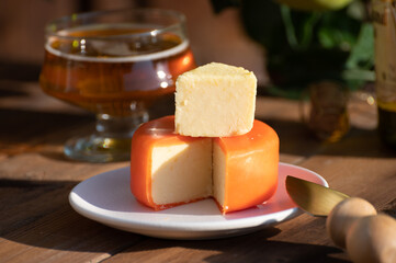 Food and drink pairing, apple cider produced on organic farm from bio apples in Normandy, France and cheddar cheese from England