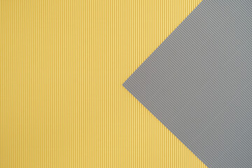 Gray and yellow two tone color paper background with stripes. Abstract background modern hipster...
