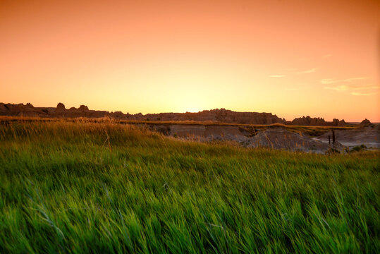 Sunset over the mountains in Badlands South Dakota © Jeff