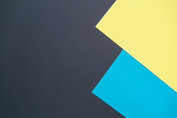 Blue, black, yellow, three tone color paper background with stripes. Abstract background modern hipster futuristic. Texture design