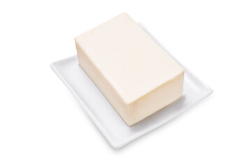 Fresh butter  briquette on a white isolated background