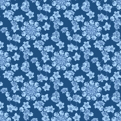 Pattern con piccoli fiori turchesi su sfondo azzurro