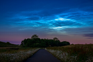 Fototapeta na wymiar noctilucent clouds also polar mesospheric clouds or night shining clouds