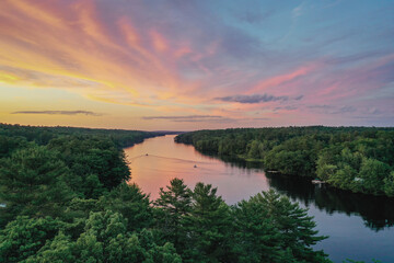 Naklejka na ściany i meble Amazing Sunset over Biscay Pond and Pemaquid River in July Bristol Maine aerial