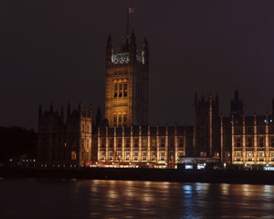 Fototapeta na wymiar Palace of Westminster at night. Reflections on the river. The meeting place for houses of the Parliament of the United Kingdom. London, England.