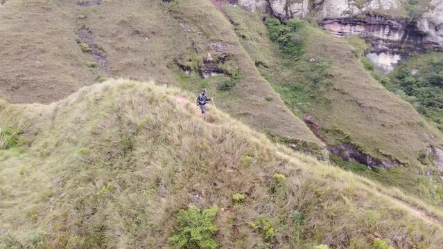 Group of young people hiking in the mountains near Samaipata Bolivia - CODO DE LOS ANDES - SANTA CRUZ BOLIVIA