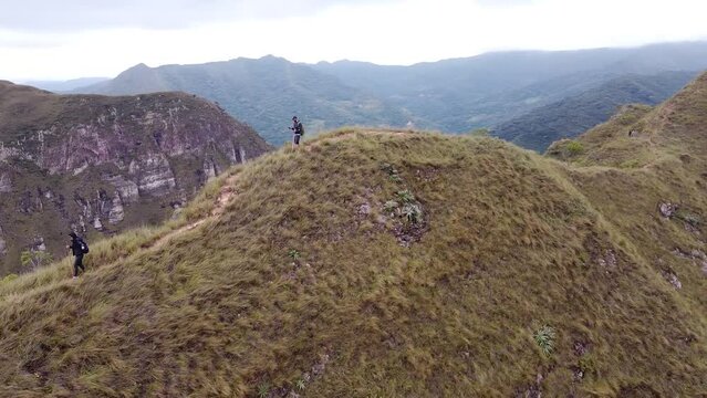 Group of young people hiking in the mountains near Samaipata Bolivia - CODO DE LOS ANDES - SANTA CRUZ BOLIVIA