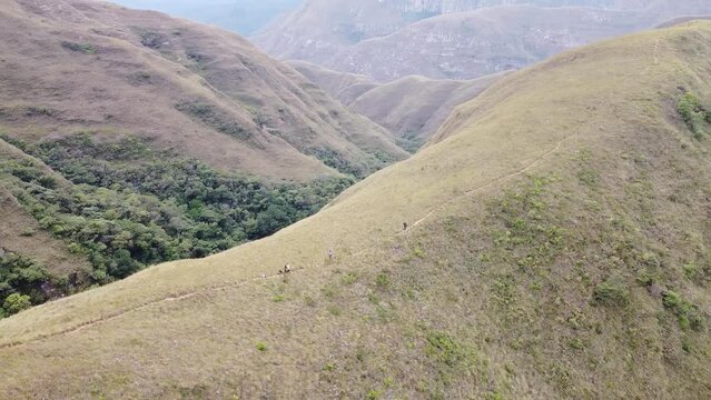 Group of young people hiking in the mountains near Samaipata Bolivia - CODO DE LOS ANDES - SANTA CRUZ BOLIVIA