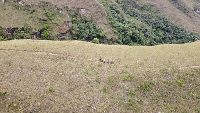 Group of young people hiking in the mountains near Samaipata Bolivia - CODO DE LOS ANDES - SANTA CRUZ BOLIVIA