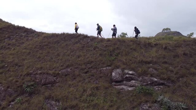 Group of young people hiking in the mountains near Samaipata Bolivia