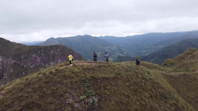 Group of young people hiking in the mountains near Samaipata Bolivia
