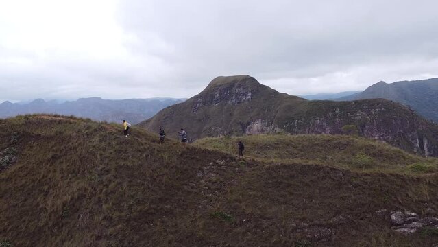 Group of young people hiking in the mountains near Samaipata Bolivia
