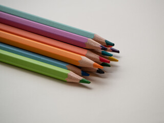 close up of colour pencils isolated on white background