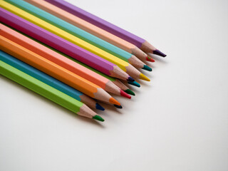Drawing supplies: assorted color pencils, isolated on white background