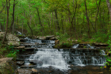 Fototapeta na wymiar Long exposure of a waterfall on the Collins Creek Trail in Heber Springs, Arkansas