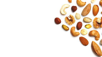 Different nuts collection, cashew, hazelnut, almond, brazil nut, walnut, peanut, pistachios, macadamia and pecan isolated on white background