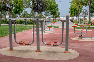 Outdoor sports area with multi functional equipment in outdoorpark,Sports equipment for healthy living in the outdoor park area,