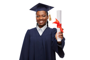 education, graduation and people concept - happy graduate student woman in mortarboard and bachelor...