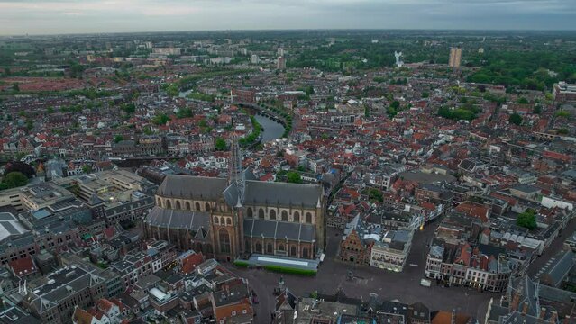 Aerial hyper lapse of sunrise at the Haarlem city center grote markt with Sint Bavo church