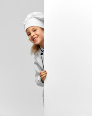 cooking, culinary and profession concept - happy smiling little girl in chef's toque and jacket with white board over grey background