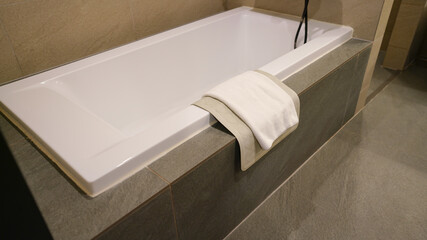 bathtub with mat