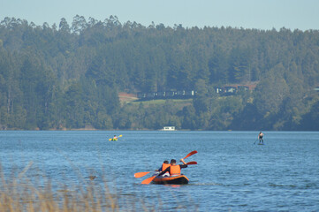 kayak and paddle surf , aquatic sport