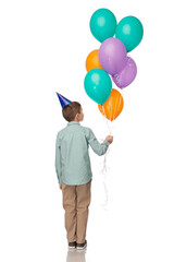 birthday, childhood and people concept - little boy in party hat with balloons over white background
