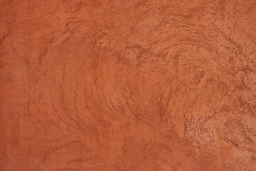 Orange-brown cement wall texture background, wallpaper abstract grunge pattern surface retro backdrop.