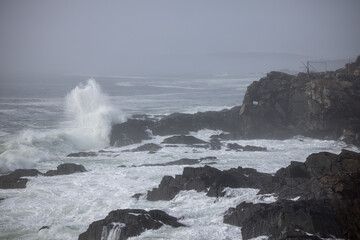 Ocean waves crashing on a rocky shore