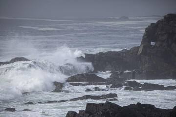 Ocean waves crashing on a rocky shore