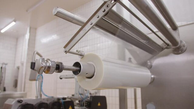 Large roll of polyethylene at industrial plant