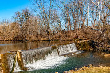 A View of a Man Made Dam and Waterfall, Found in the Countryside on a Sunny Winter Day