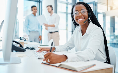 Contact us, crm and online support by call center agent writing note and help customer in office. Smiling black operator enjoy communication and giving expert advice, being friendly and professional