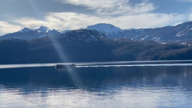 A Tour Boat on the Lacar Lake near Quila Quina Village, Patagonia, Neuquen Province, Argentina. 4K Resolution.