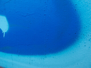 Bright streaks of paint on a wall. Empty abstract background.