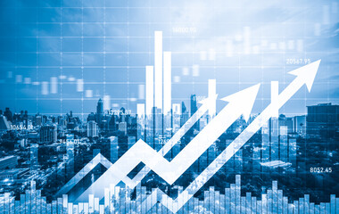 Financial graphs and digital indicators overlap with modernistic urban area, skyscrabber for stock market business concept. Double exposure.