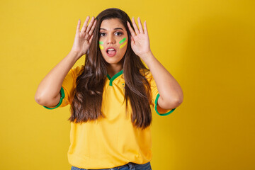 Woman supporter of Brazil, world cup 2022, football championship, anxious, attentive while watching...