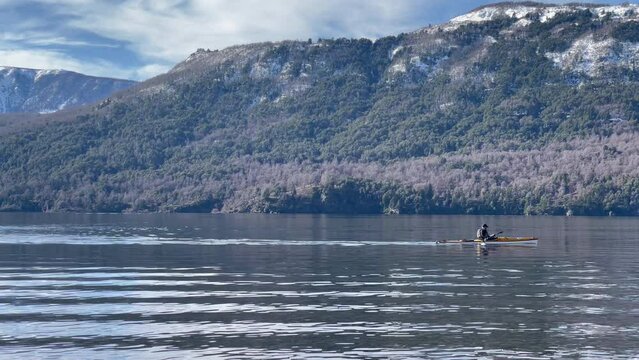 A Man Kayaking on Lake Lacar, San Martin de los Andes, Patagonia, Argentina. 4K Resolution.