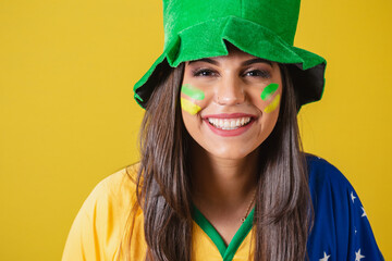 Close-up photo, Woman supporter of Brazil, world cup 2022, focus on the look, on the smile. wearing...