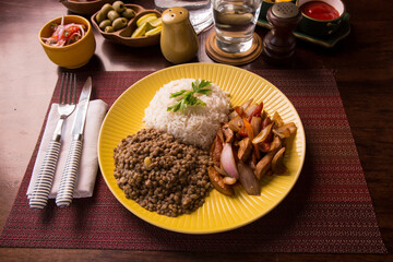 Pollo saltado con lentejas sauted chicken with lentils peruvian gourmet restaurant comfort food