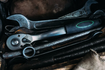 Set of wrenches for repairing cars and equipment. Close-up of locksmith equipment. Real background.