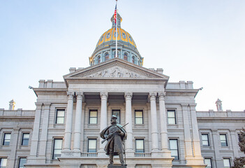 Colorado State Capitol building and civil war monument on a cloudy morning in Denver Colorado